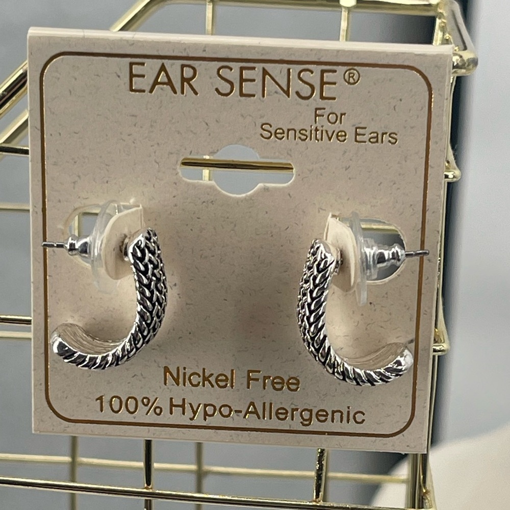 Ear Sense NWT braided silver toned earrings